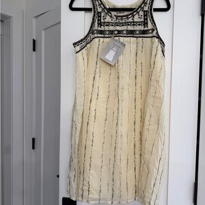 Elegant Cream and Black Sleeveless Dress